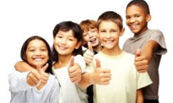 Happy children with thumbs up over white background